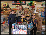 Cub Scouts sell items for charity at a Kroger charity table!